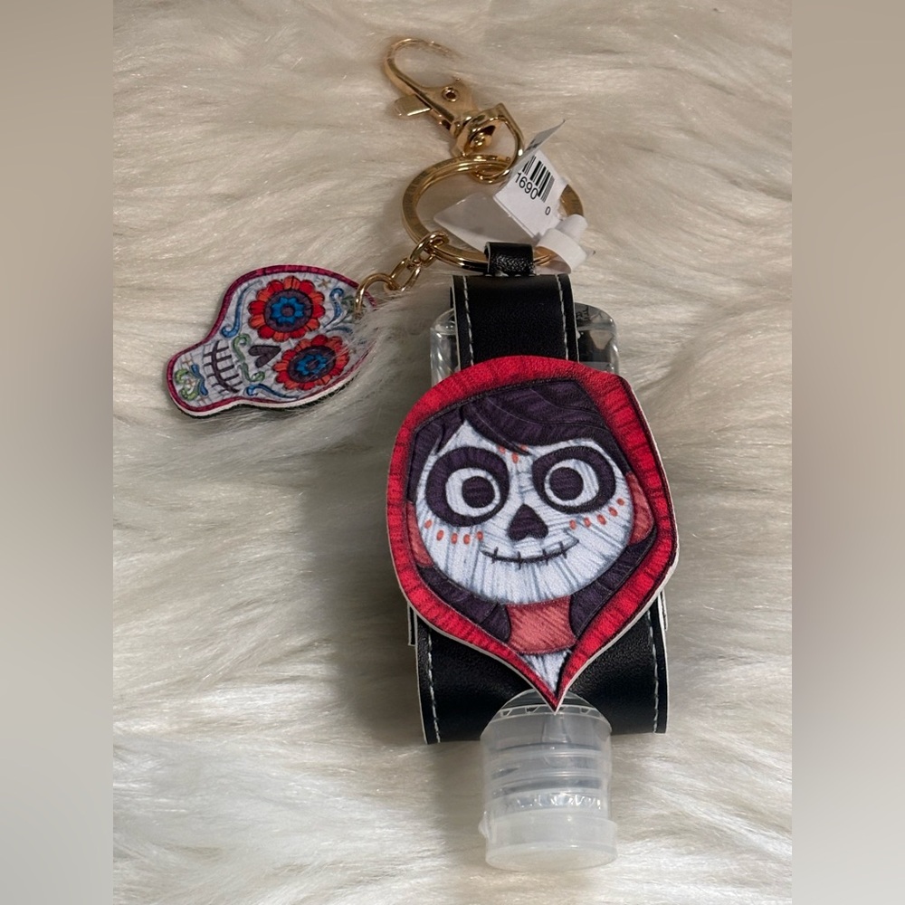 DISNEY PARKS PIXAR COCO MIGUEL DIA DE LOS MUERTOS 1 OZ SANITIZER HOLDER KEYCHAIN